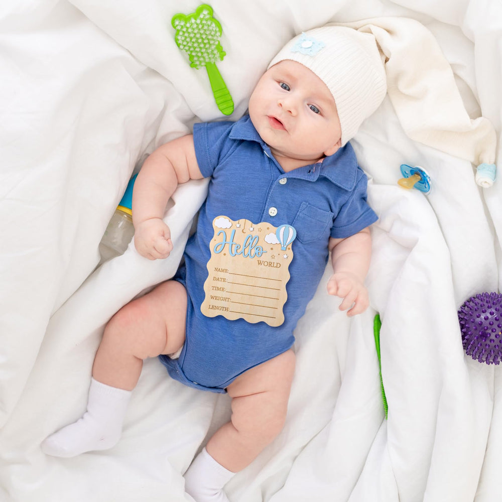 WSICSE Whimsical blue sign enhances nursery decor and photos.