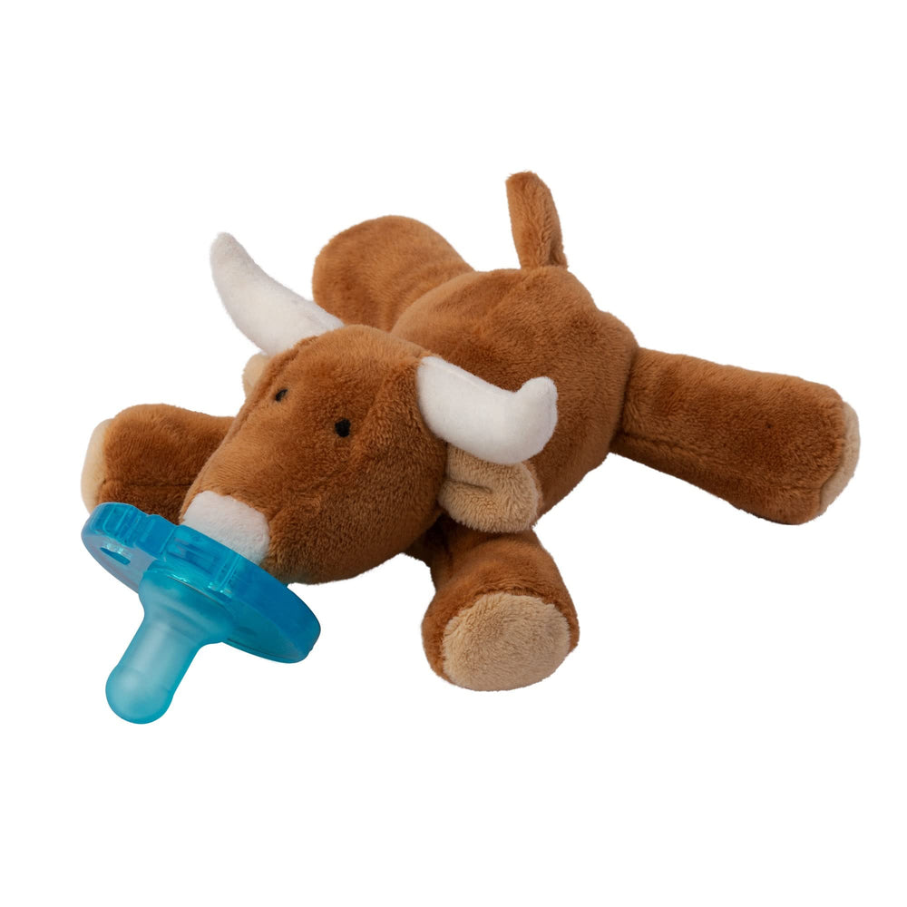 WubbaNub infant pacifier closeup demonstrates one-piece design for safety.