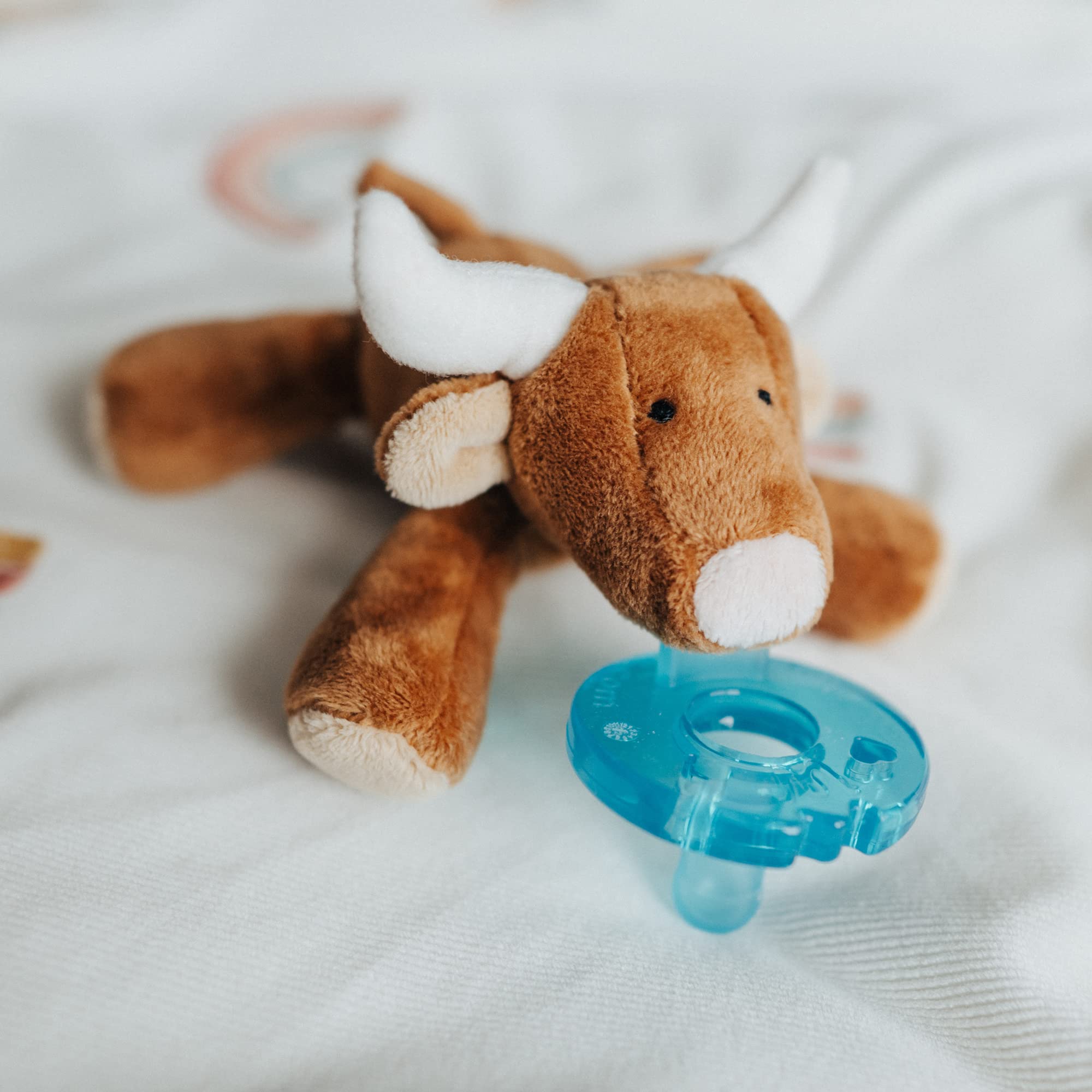 WubbaNub silicone pacifier is latex-, BPA-, PVC-, phthalate-free.