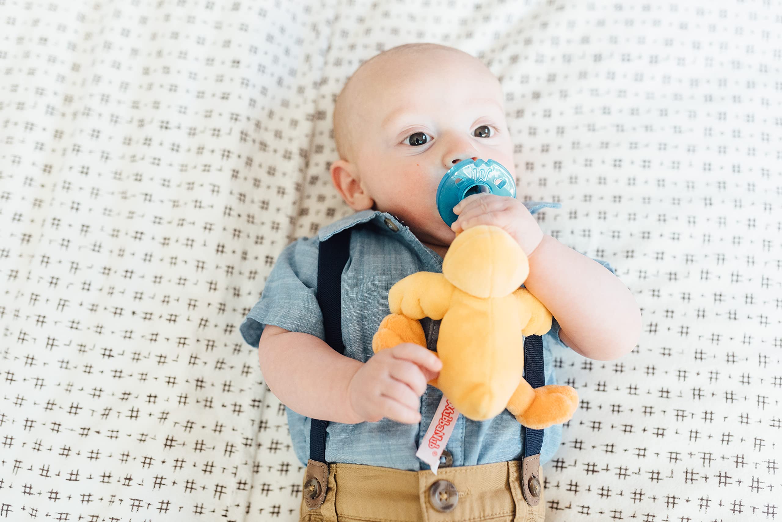 WubbaNub yellow duck in nursery scene illustrating comforting companion during daily routines