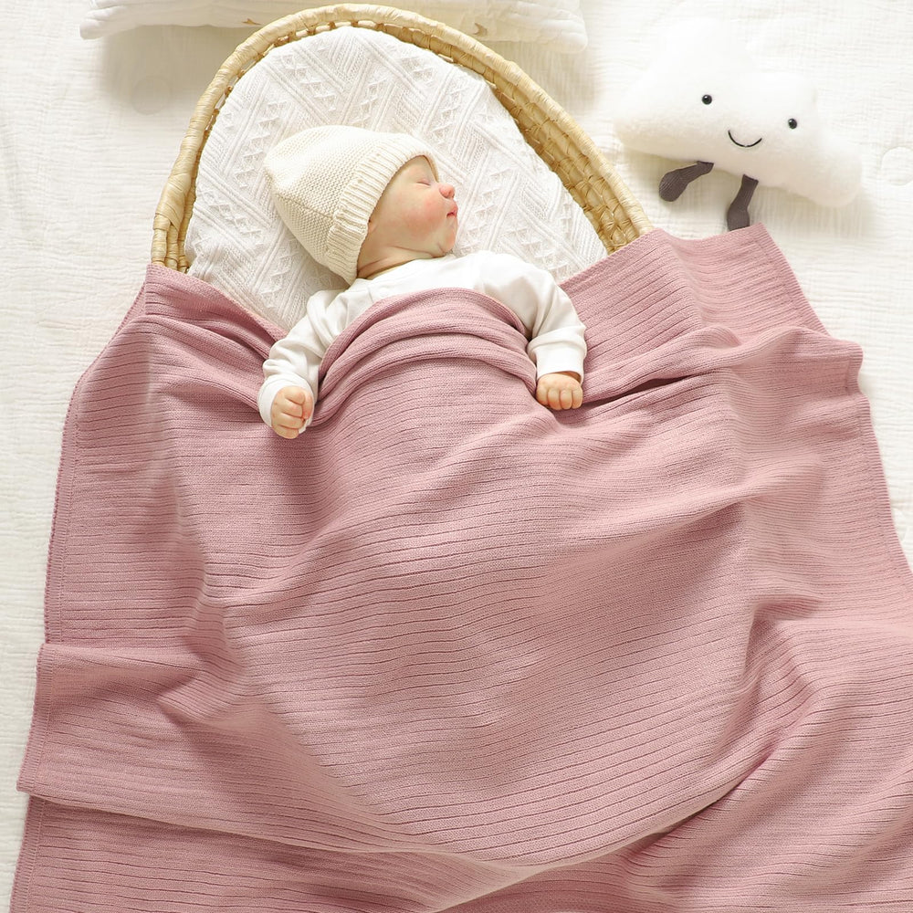 Wugugu swaddle 30x40 cotton knit highlighted for versatile use.