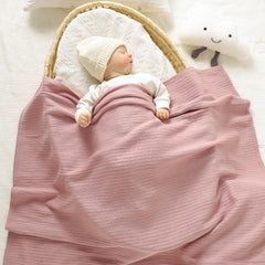 Wugugu swaddle 30x40 cotton knit highlighted for versatile use.