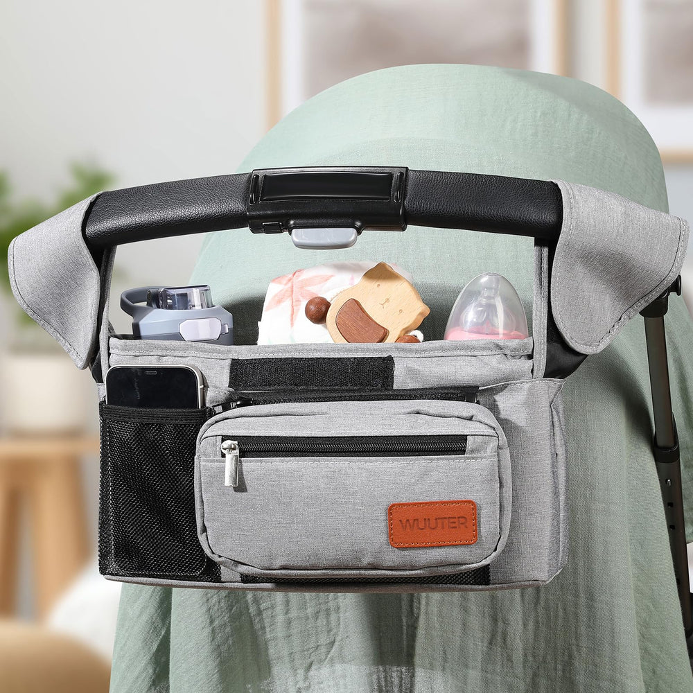 WUUTER detachable wristlet shown for hands-free carrying of essentials.