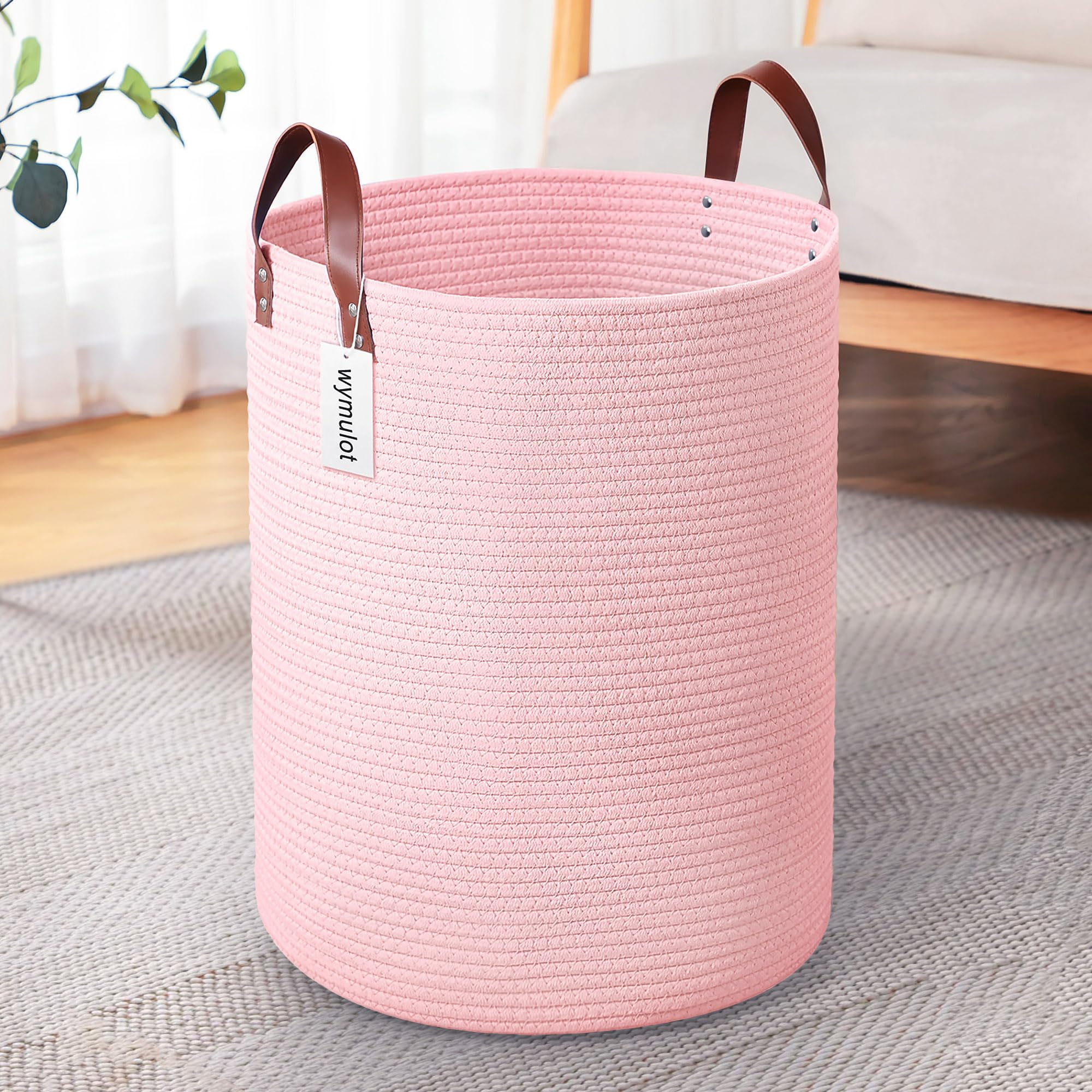 Wymulot pink rope basket front view with leather handles for easy transport.