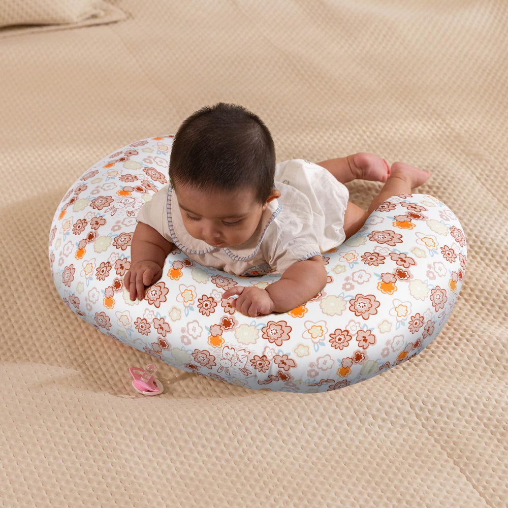 x-vesolje nursing pillow offers ergonomic support during feeding sessions.