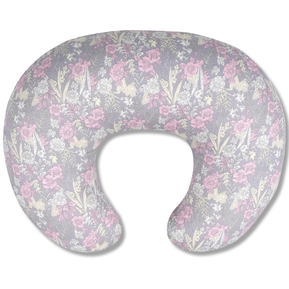 x-vesolje nursing pillow front view in dusky floral offers ergonomic feeding support.