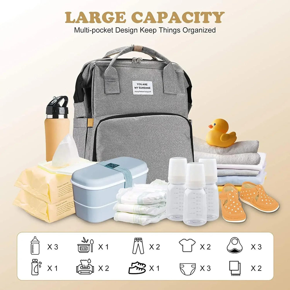 X W EI UNION diaper backpack with large capacity and organized pockets for gear.