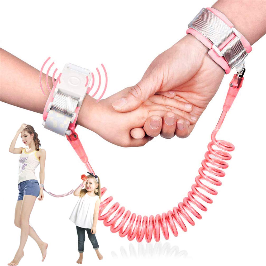 Xemz kids anti lost wrist link pink worn by a child for staying within reach during outings