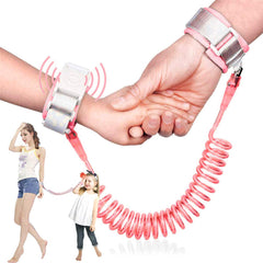 Xemz kids anti lost wrist link pink worn by a child for staying within reach during outings