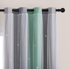 XiDi Rainbow Blackout Curtains star cutouts provide 80% light reduction for better nap times.
