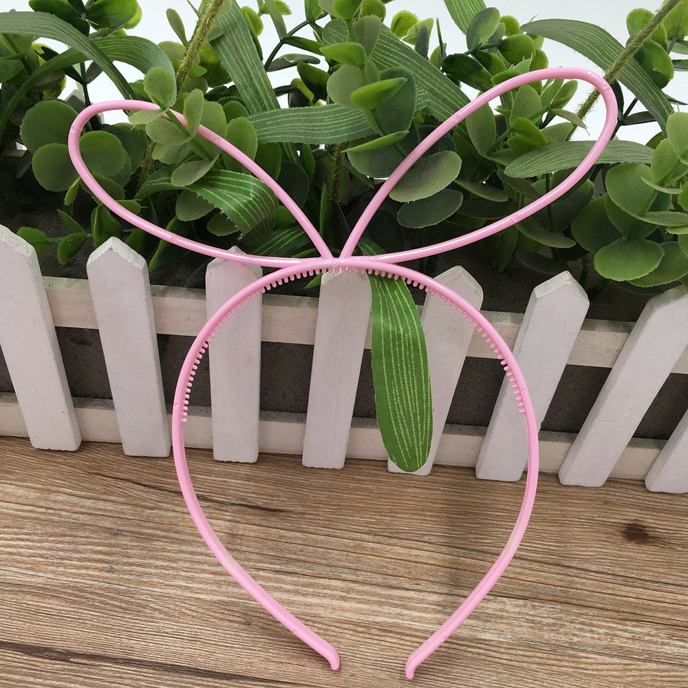 XIMA headbands worn by a child at a party or event.