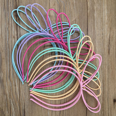 XIMA plastic headbands bunny-ear design suitable for dress-up and celebrations.