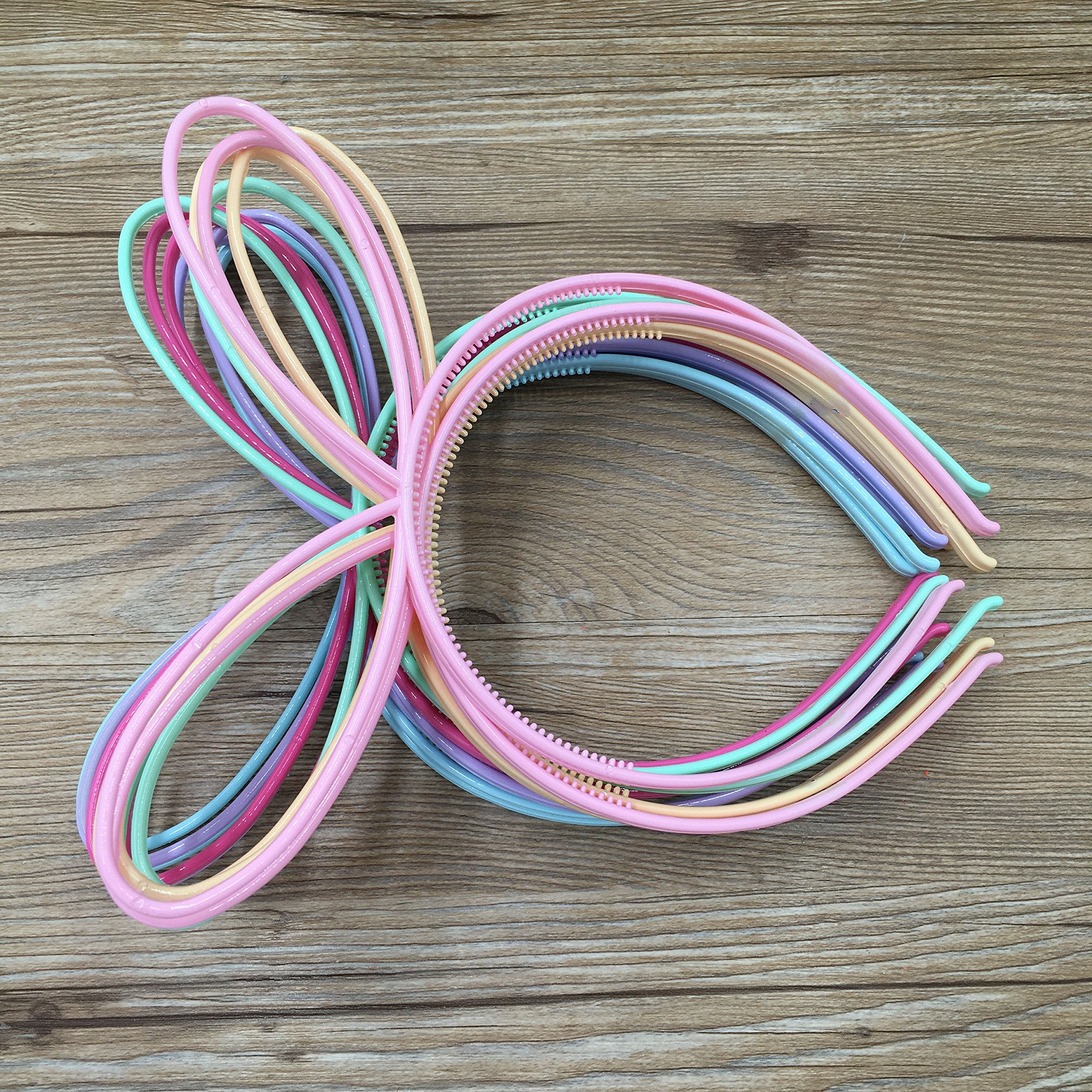 XIMA rabbit-ear headbands on display in a 12-pack.