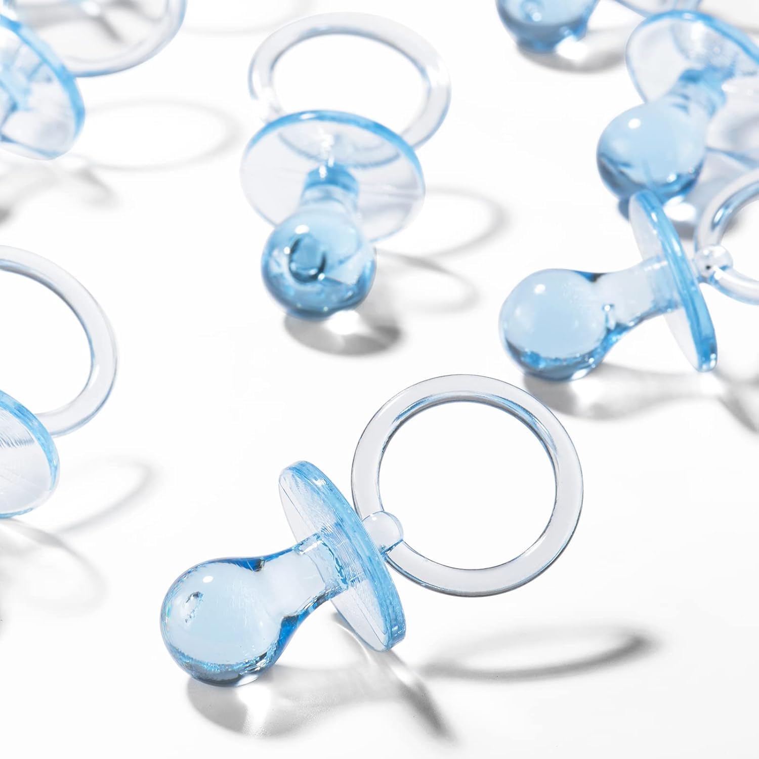 XINHUIDALSQ gender-reveal blue pacifiers enhance reveal moments.