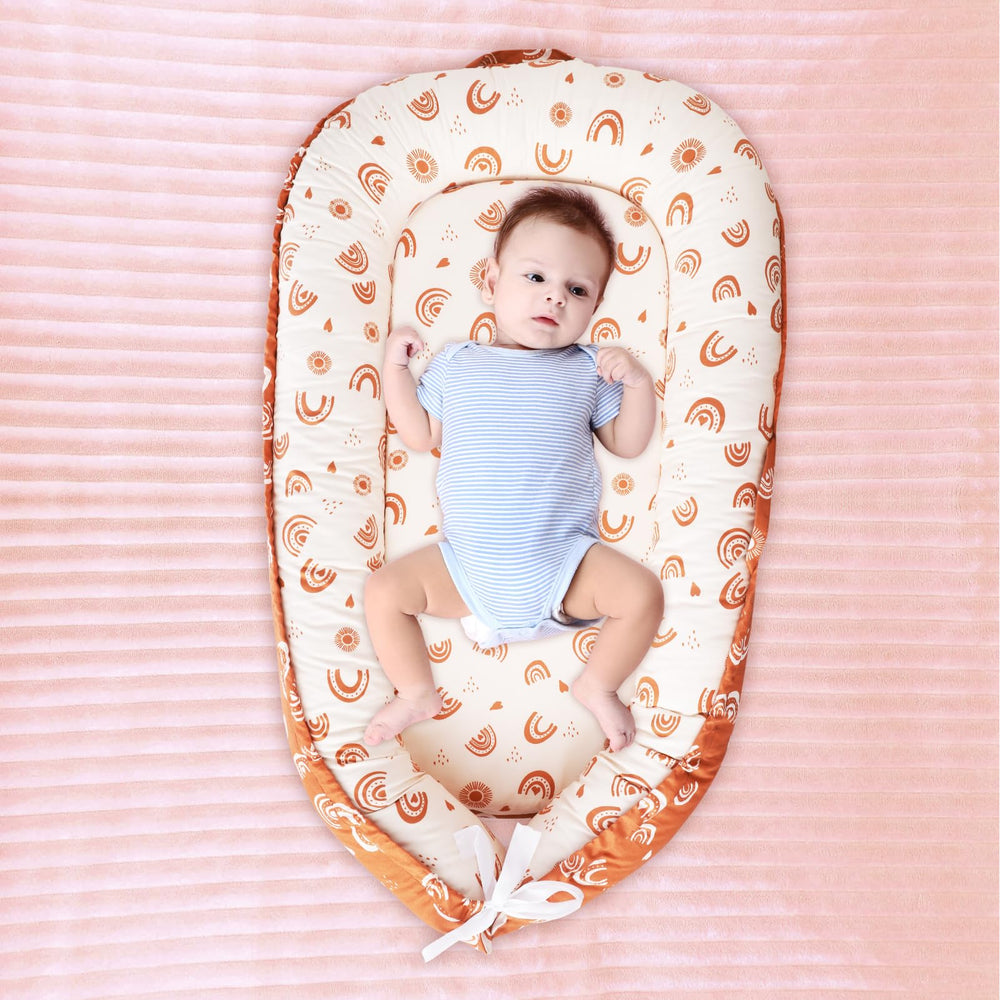 XLSXEXCL Nest Cover in a nursery setup with rainbow decor