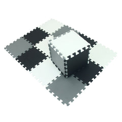 XMTMMD interlocking foam tiles in playroom colors illustrate easy-to-clean, modular floor solution.