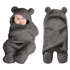 XMWEALTHY newborn plush swaddle blanket with bear hoodie provides cozy warmth and snug security.
