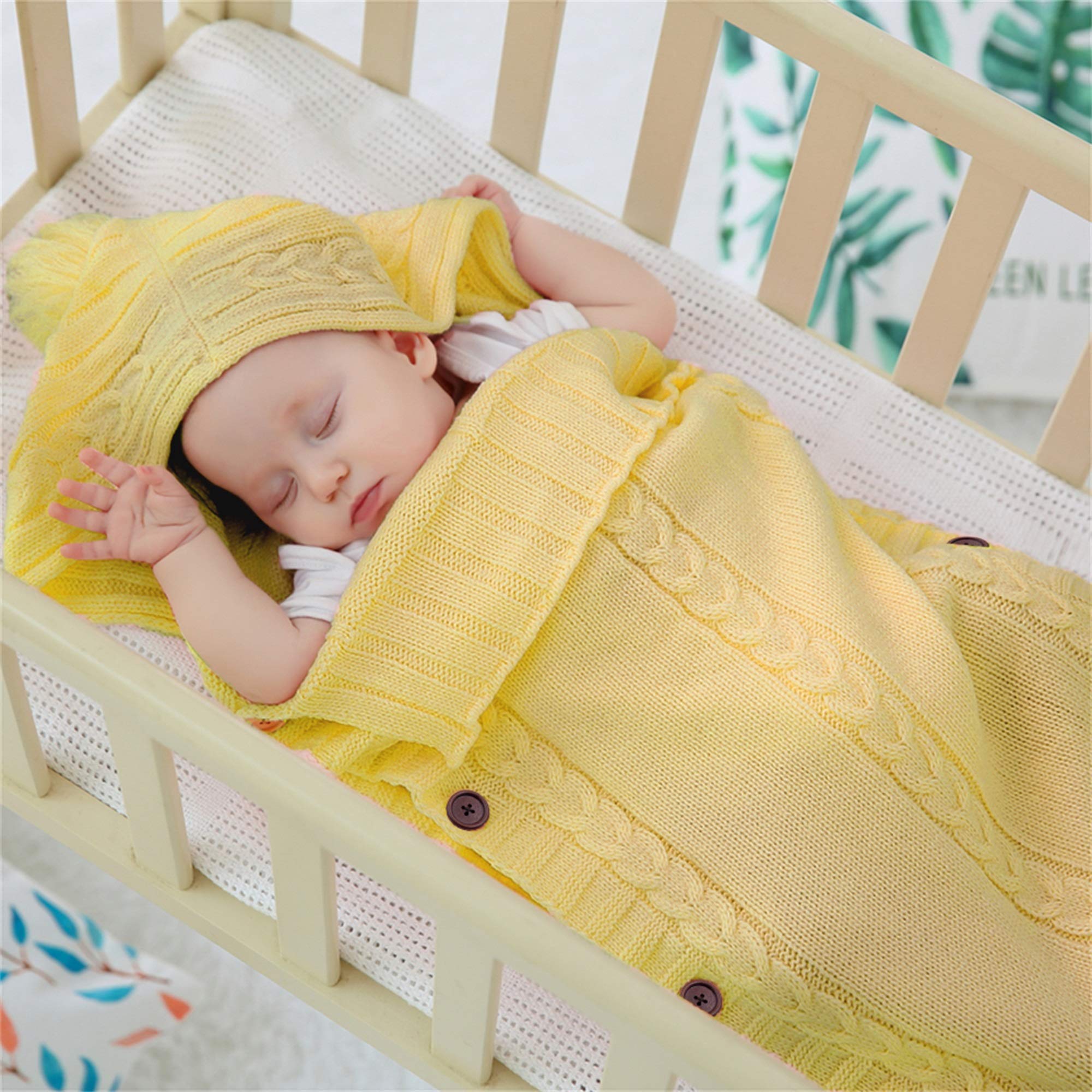 XMWEALTHY newborn wrap swaddle turmeric shows wooden buttons for quick adjustments.