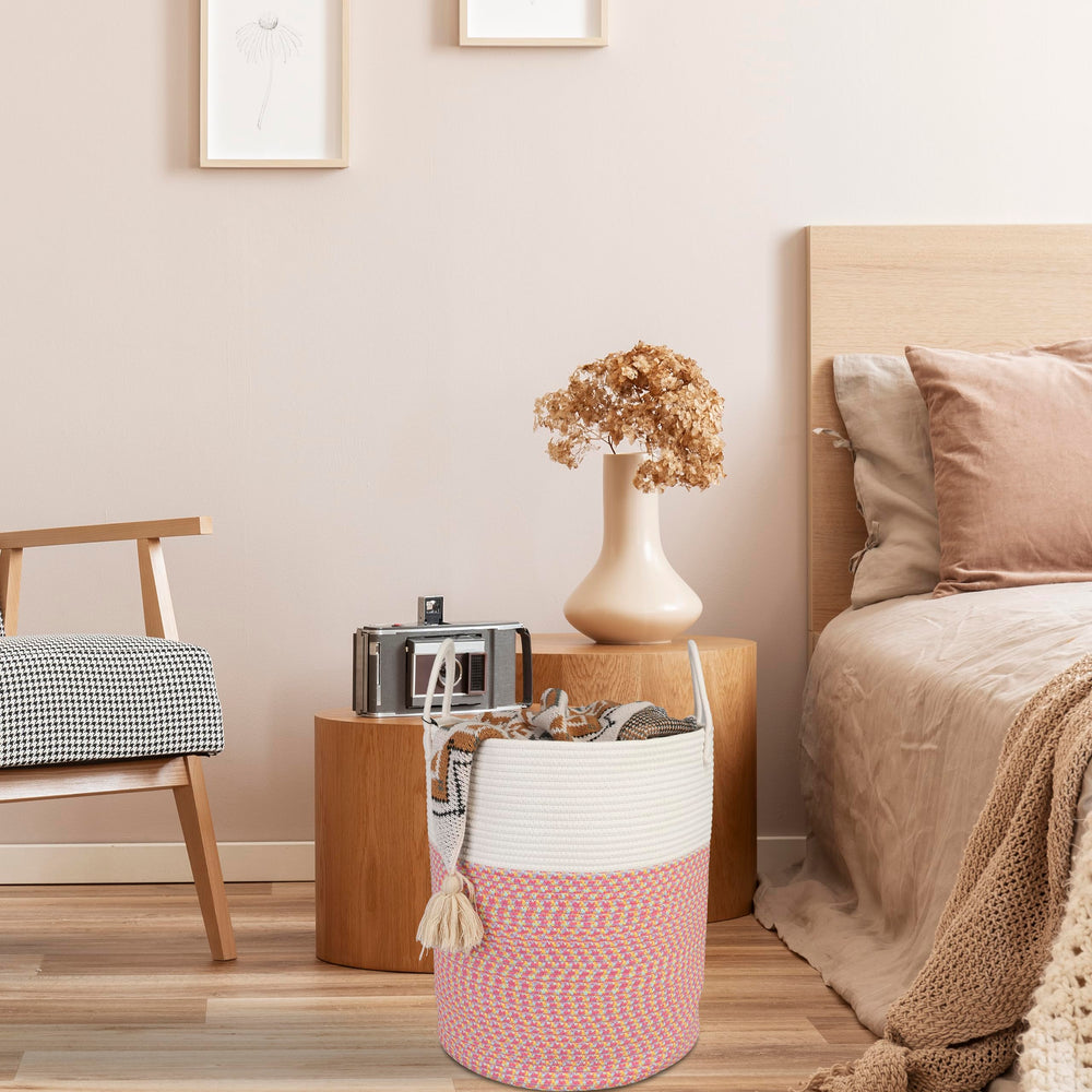 XUANGUO rope laundry basket stores towels and throws.