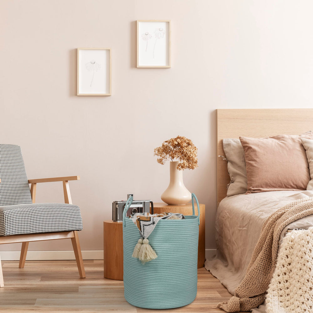 XUANGUO basket with towels demonstrates tidy bathroom storage