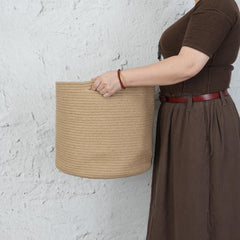 XUANGUO round blanket storage basket ideal for blankets and essentials.