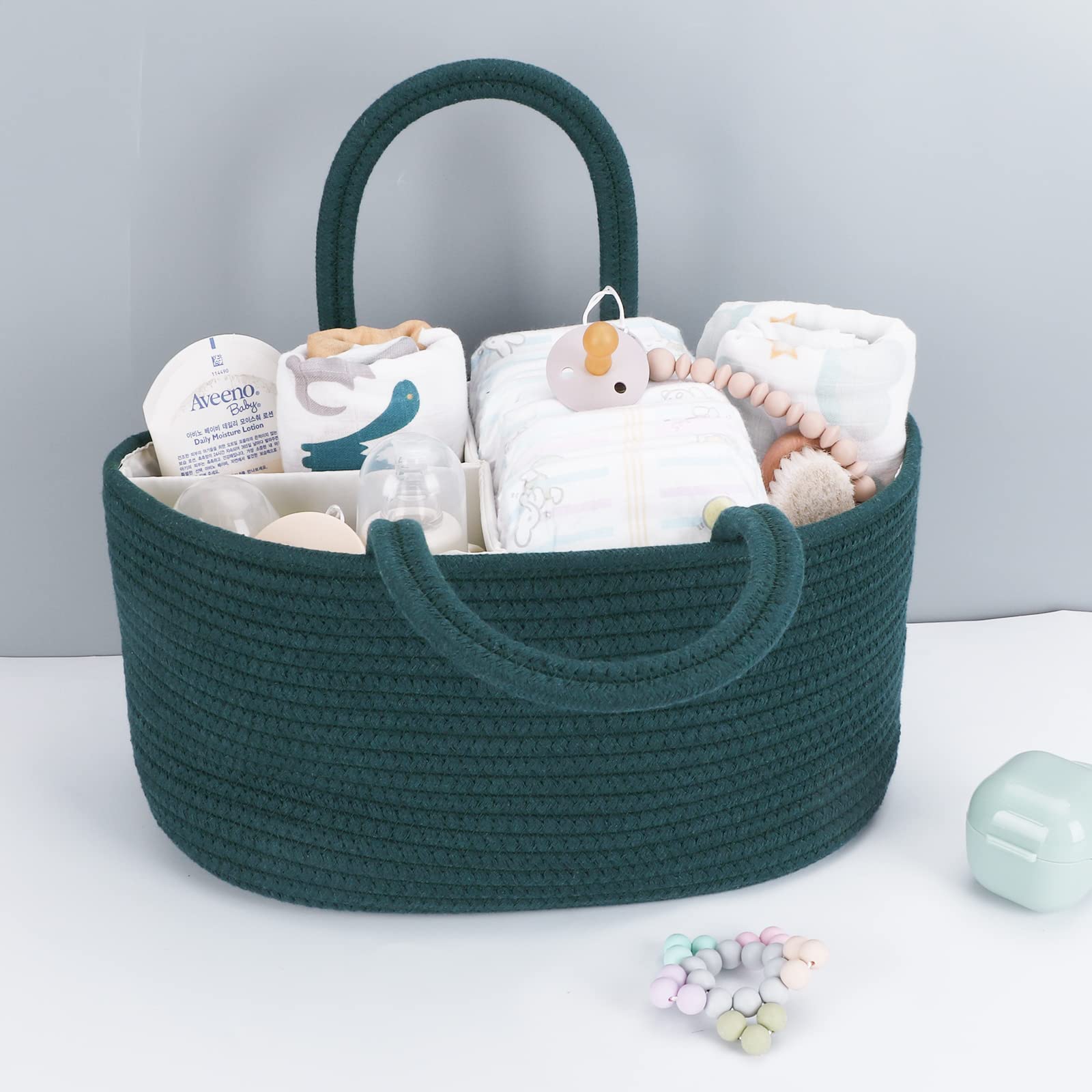 XUANGUO nursery-storage-bin-multi-compartments keeps wipes, diapers, and accessories organized.