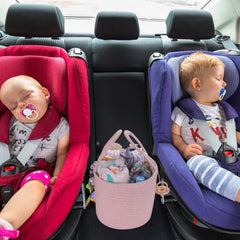 XUANGUO portable diaper caddy pink handle demonstrates easy transport for travel and car trips.