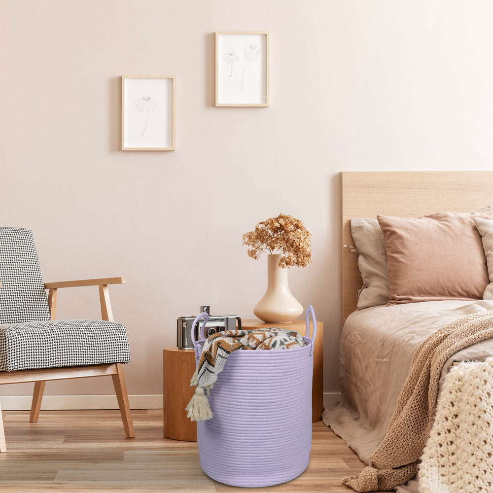 XUANGUO rope laundry basket stores blankets neatly in living spaces.