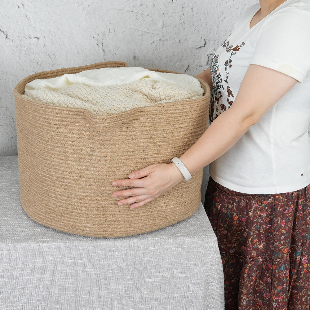 XUANGUO round storage basket in decor-ready colors for spaces.