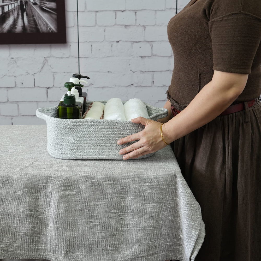 XUANGUO small rope basket organizes nursery essentials without clutter.