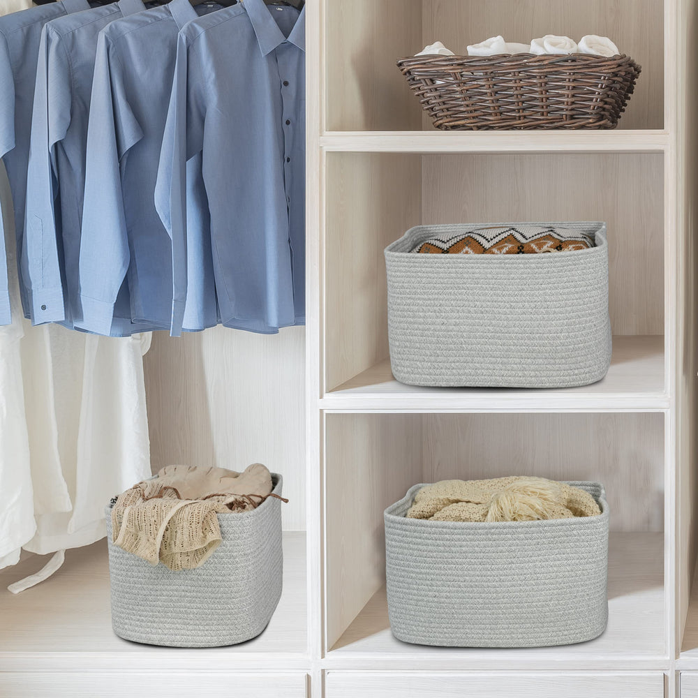XUANGUO square rope storage basket complements home decor on shelves.