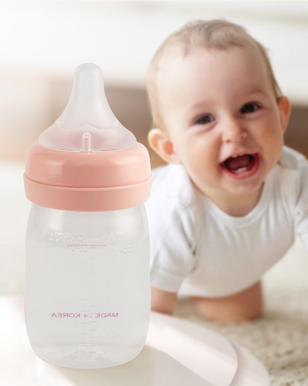 XUNICUTE Spectra-compatible nipple inset highlights bottle compatibility.