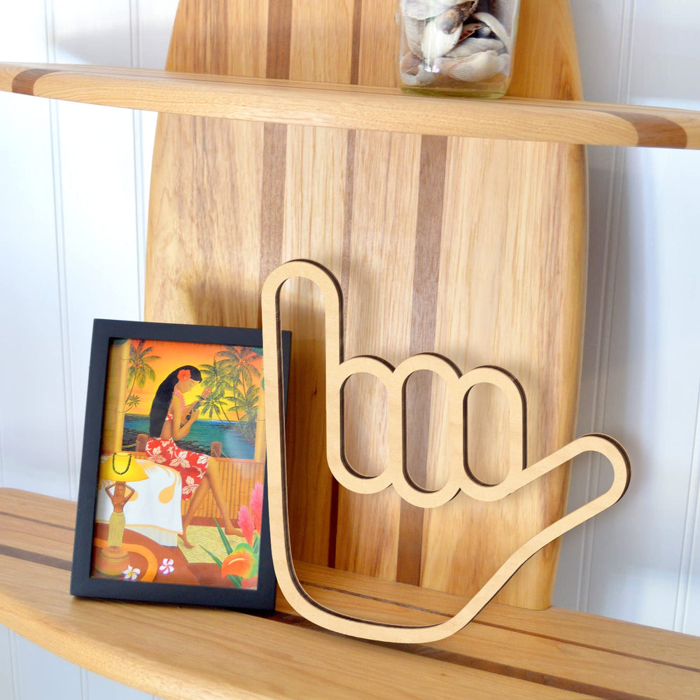 Xylolfsty Shaka wall decor complements a living room setup.
