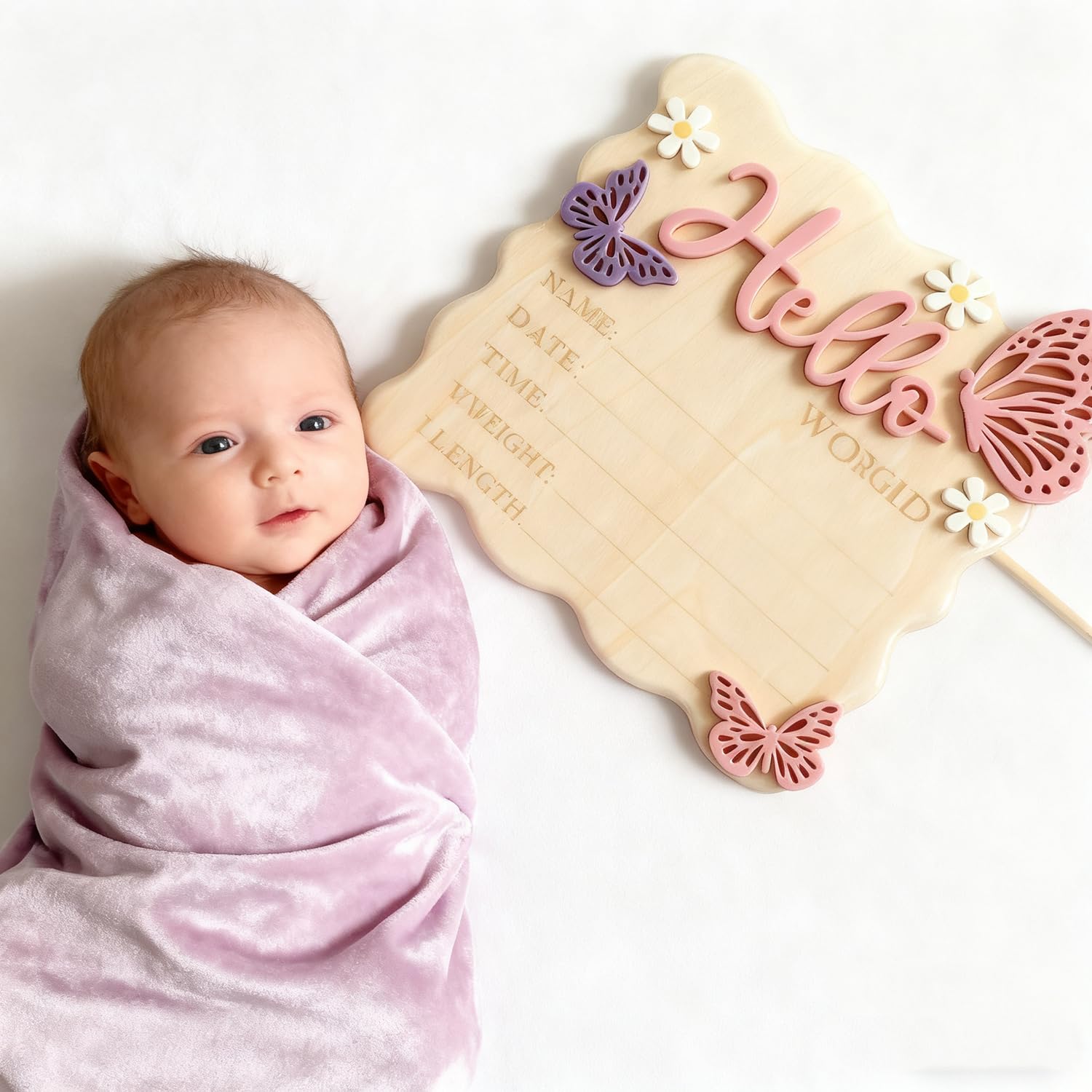 XYZRTLON Hello World sign closeup in pink showing petal-edge design