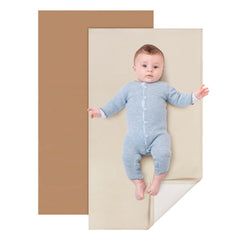 YACODAVO baby leather changing mat folded compactly for travel storage.