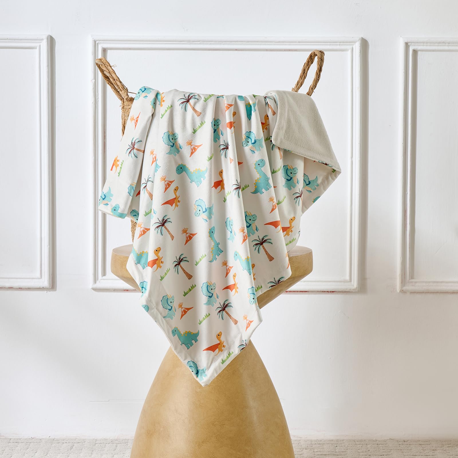 Yagle Mate baby blanket laid in crib for nap time and tummy time use.
