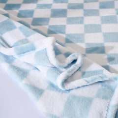 Yagle Mate baby blankets in crib scene for nursery-friendly design and warmth.