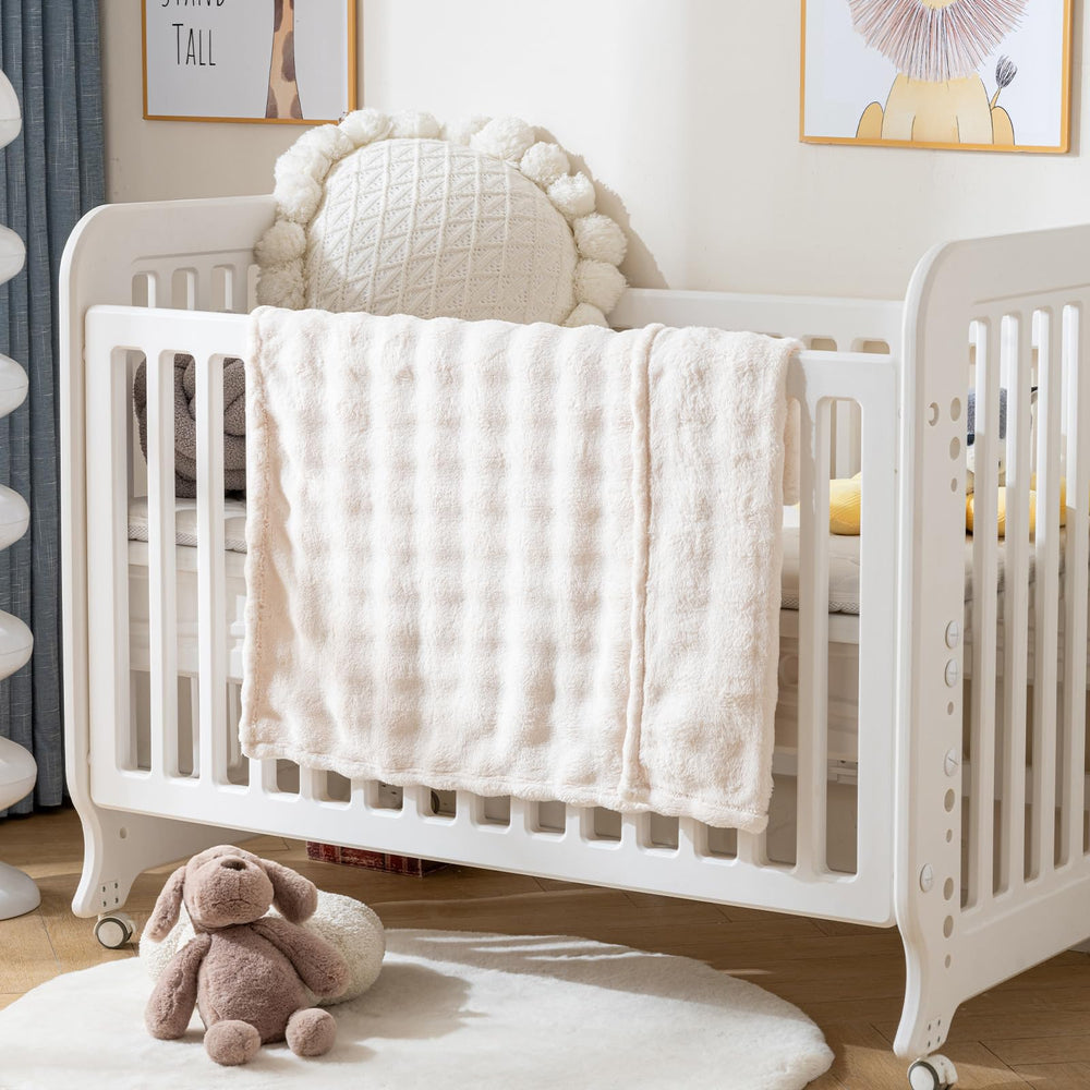 Yagle Mate blanket demonstrated in crib and stroller use scenarios