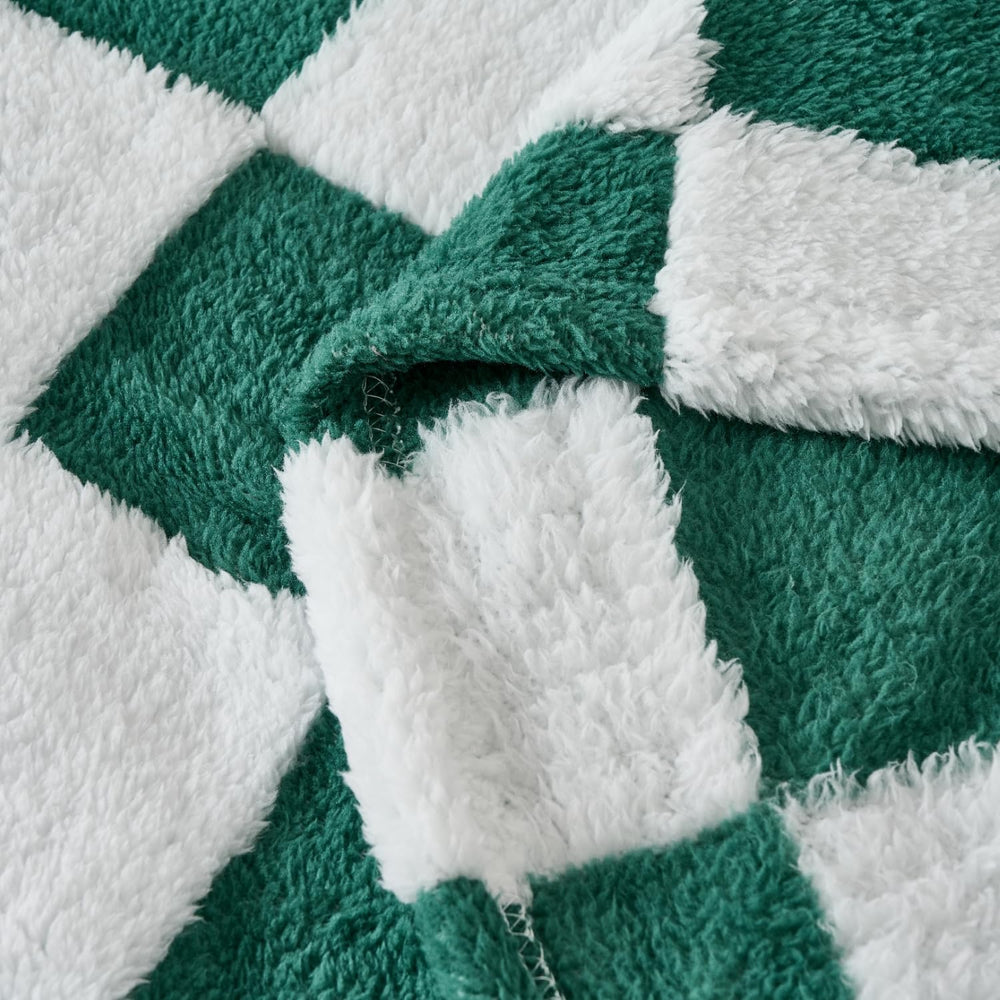 Yagle Mate fleece baby blanket in nursery decor tone enhances crib aesthetics with playful pattern.