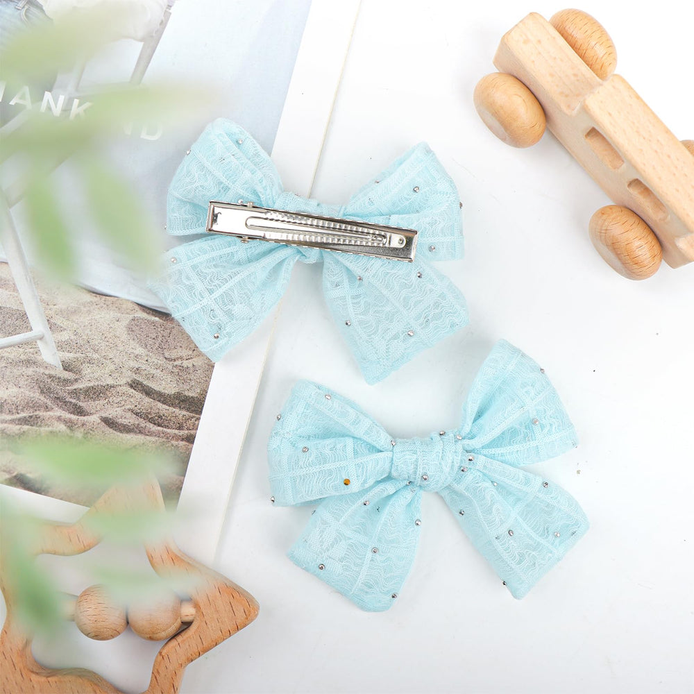 YanJie 4-inch light blue bow clip for everyday styling.