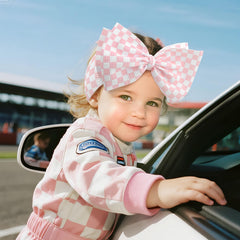 YanJie 7-inch pink checkered bow on newborn head demonstrates soft waffle fabric