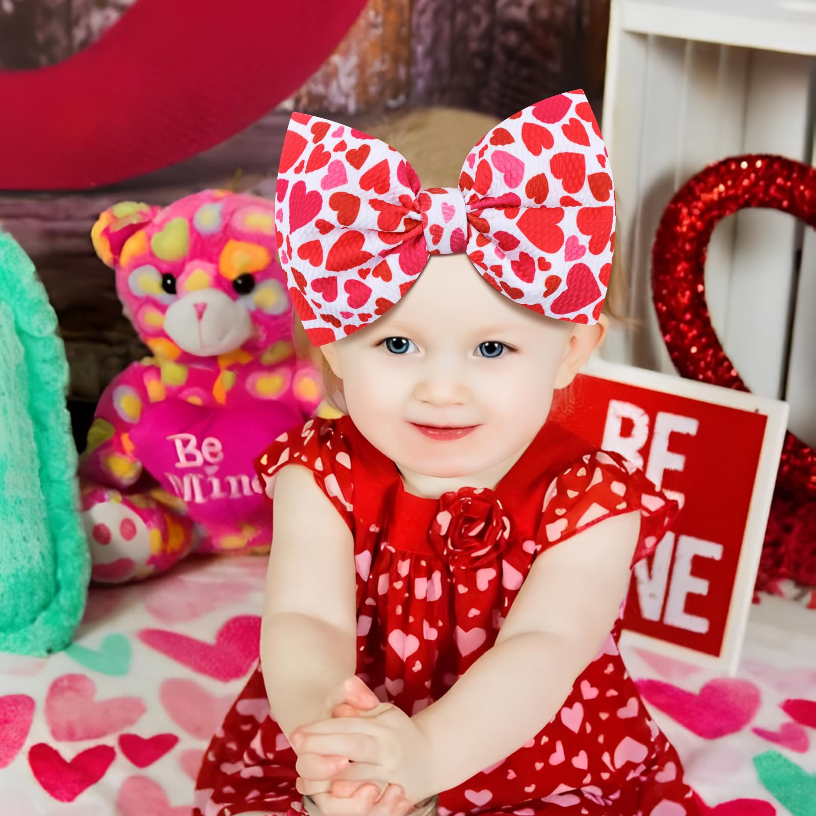 YanJie headbands stretched on infant head demonstrates secure fit without slipping
