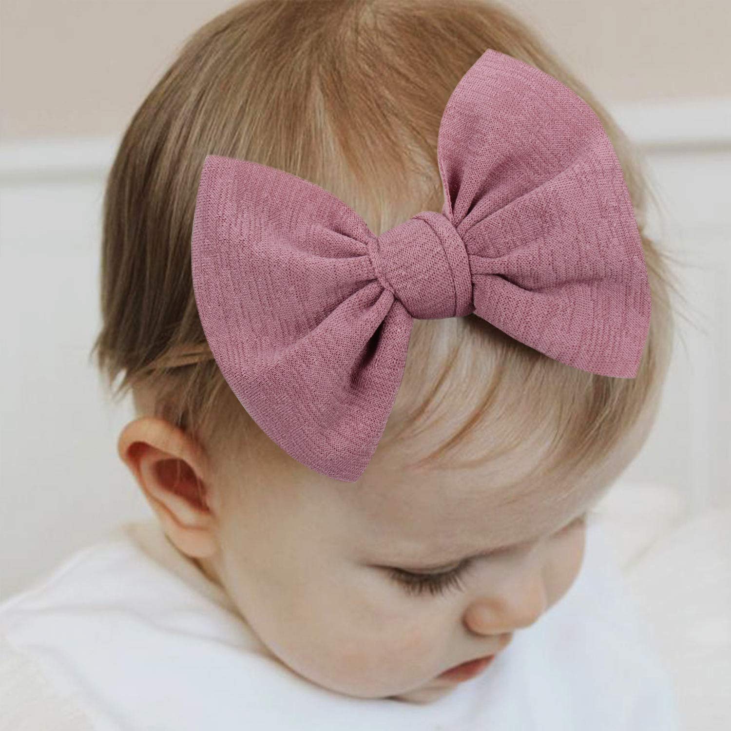YanJie blue knotted bow headband offers gentle stretch for growing toddlers