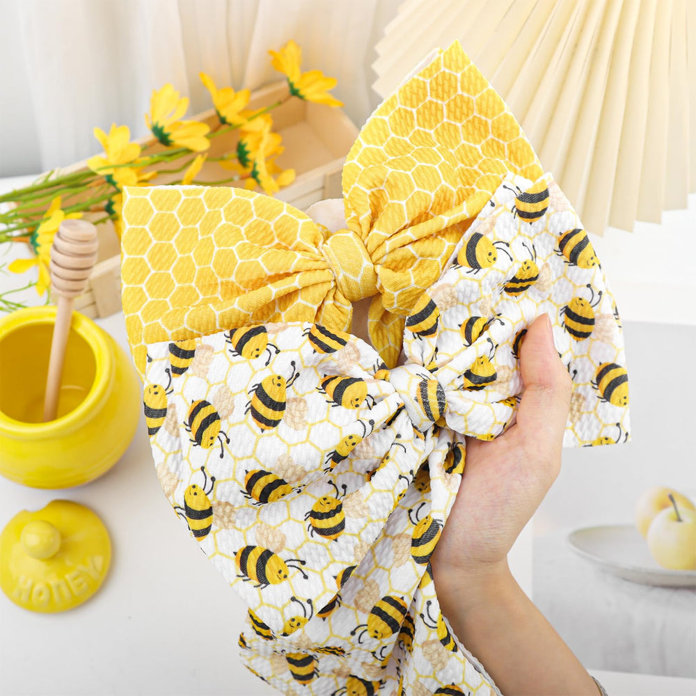 YanJie bee bows pair perfectly with striped outfits for stylish everyday looks.