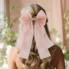 YanJie big hair bows chiffon clip champagne offers versatile sophistication for evening looks.