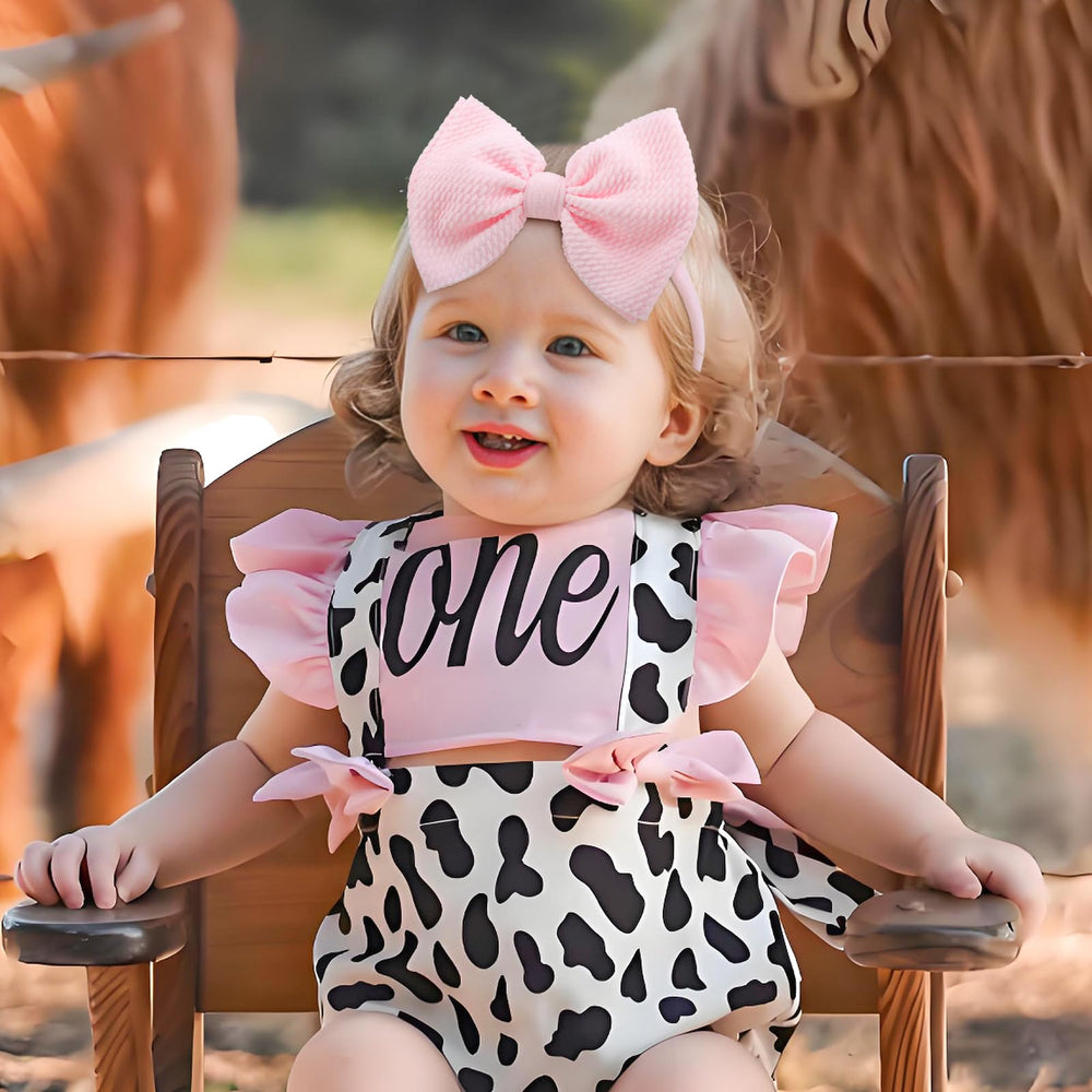 YanJie Black Pink Cow Print Bow emphasizes playful style for everyday wear.