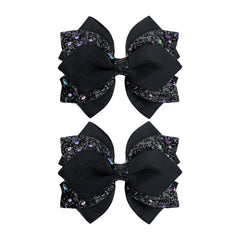 YanJie black sparkle bow clip adds secure style to everyday hairstyles.