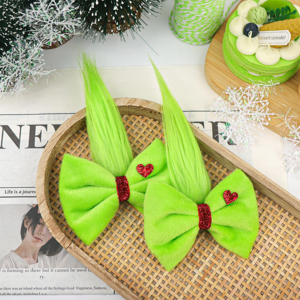YanJie Christmas hair bow with heart rhinestone detail adds festive charm for photo-ready holiday looks.