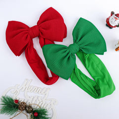 YanJie Christmas-themed bows add festive style for holiday photos.