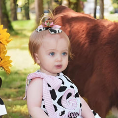 YanJie cowgirl hat bow displays classic cow print for playful outfits